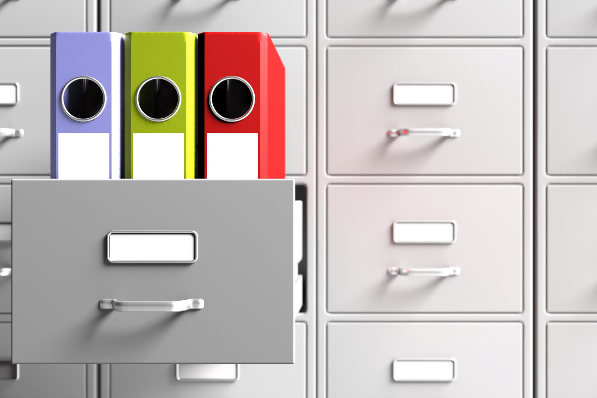 binders in file cabinet